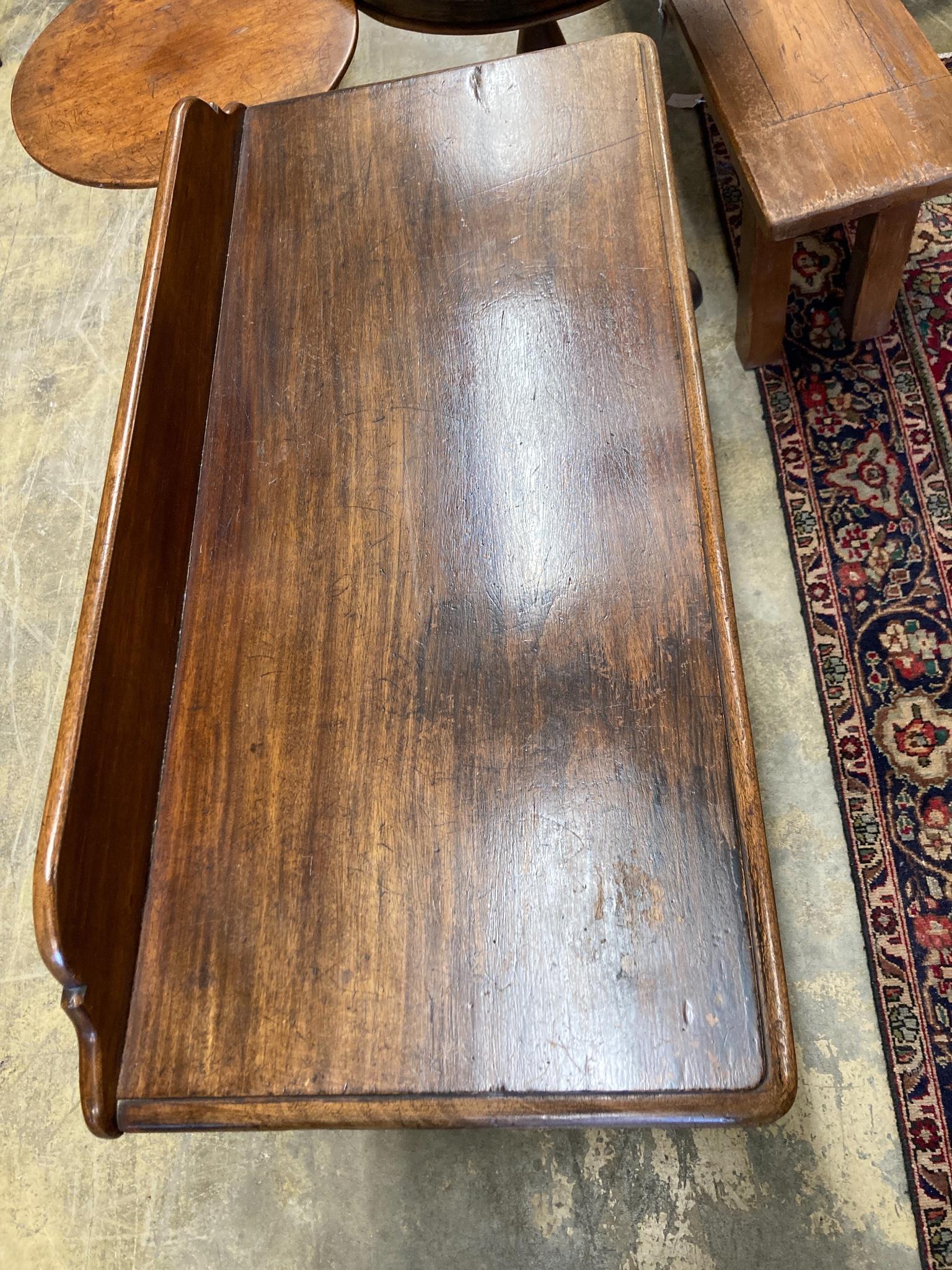 A Victorian mahogany writing table